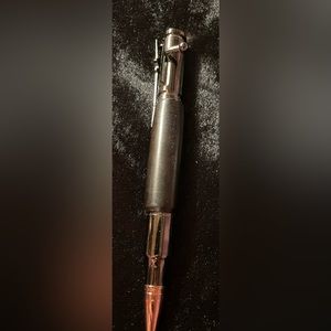 One of a kind, custom made, exotic, bolt action hardwood pen.